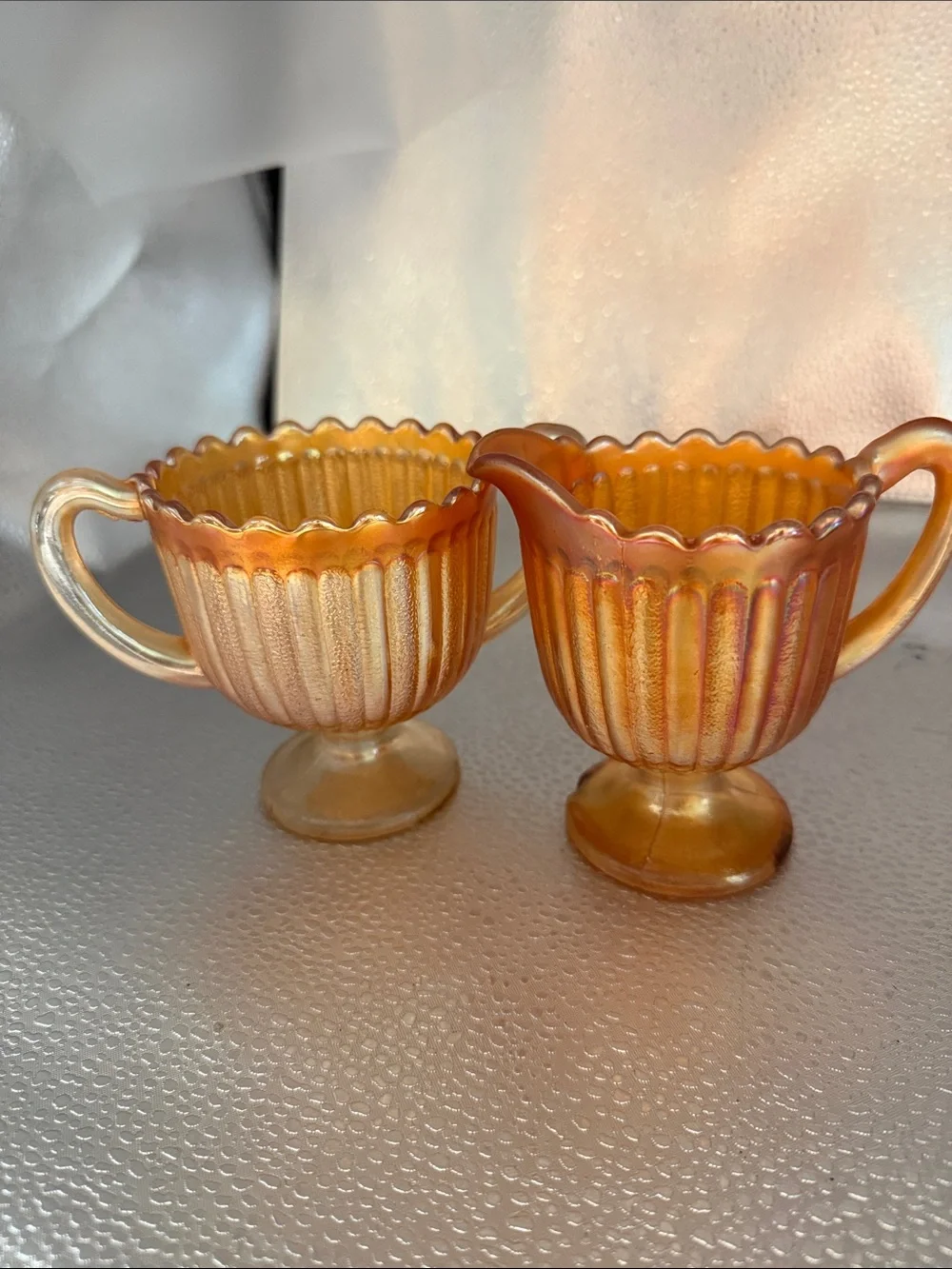 Vintage “Striped Rays” Carnival Glass sugar and creamer set.